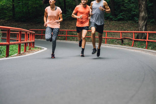 istock Three Good Friends Taking Part In A Marathon 1368607778