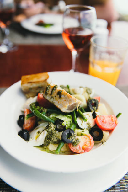 istock Nicoise Salad - dinner with ocean view 1368608491
