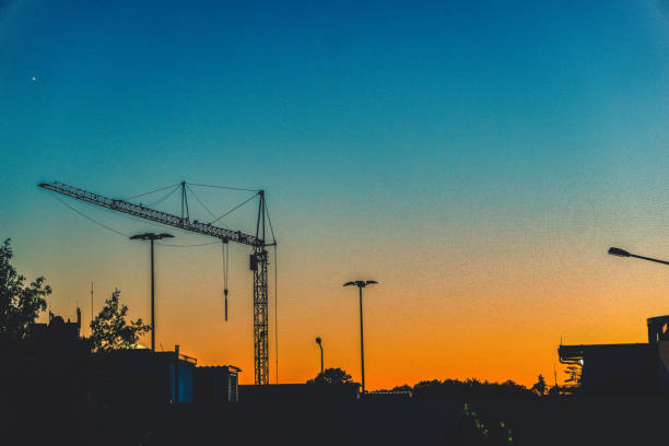 istock View of a construction site in the setting sun. 1368608595