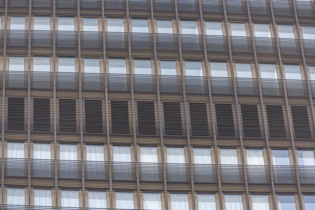 Modern commercial buildings windows in London on a day.