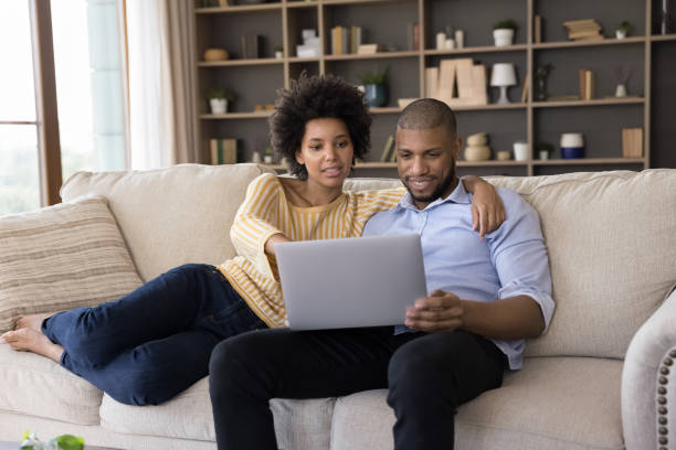 istock Millennial African married couple paying common bills 1368613380