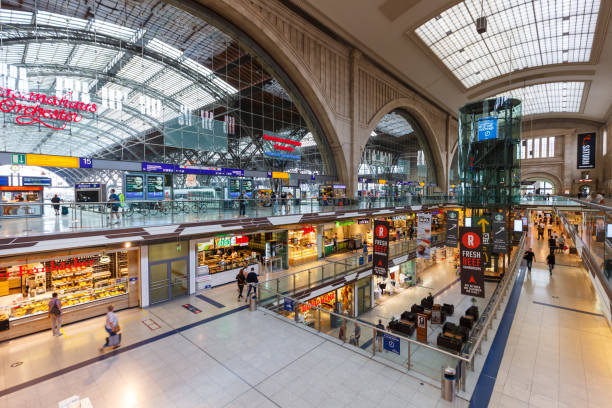 Leipzig, Germany - August 19, 2020: Leipzig main railway station Hauptbahnhof Hbf Deutsche Bahn DB hall with shops in Germany.