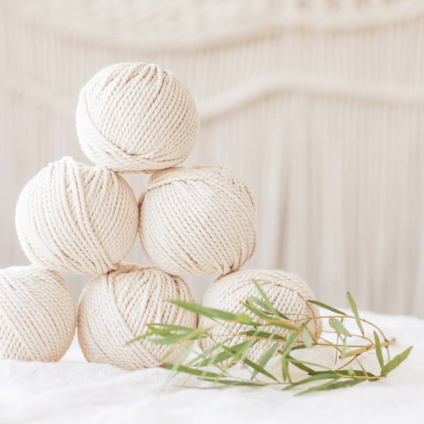 istock Handmade macrame braiding and cotton threads. Image good for macrame and handicrafts banners and advertisement.  Copy space 1368620941