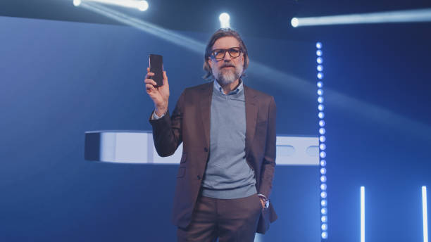 istock Presenter demonstrating a new smartphone 1368622906