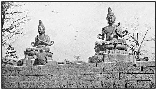 Antique travel photographs of Japan: Statue of Buddha with lotus pedestals