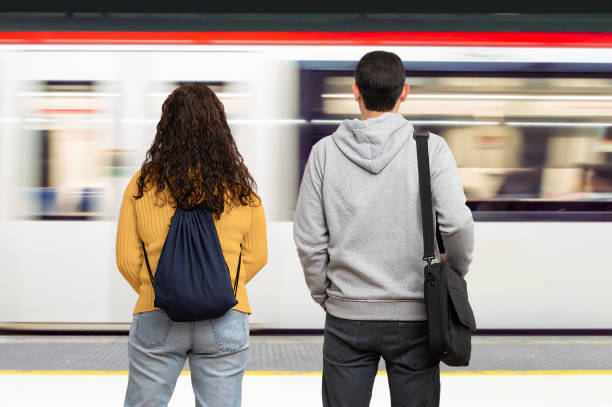 istock Couple waiting the train 1368624176