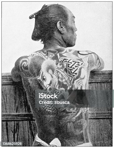 istock Antique travel photographs of Japan: Tattooed man 1368625928