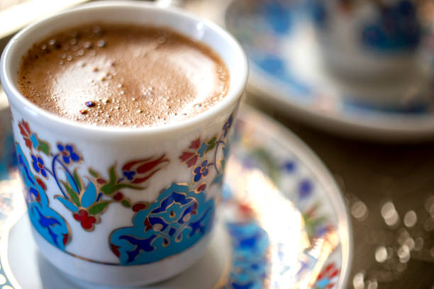 blue tile embroidered turkish coffee cup stock photo