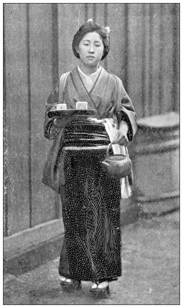 istock Antique travel photographs of Japan: Bringing tea 1368630355