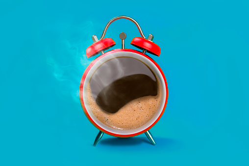 A coffee mug with an alarm clock look. It was made using the photo manipulation method.