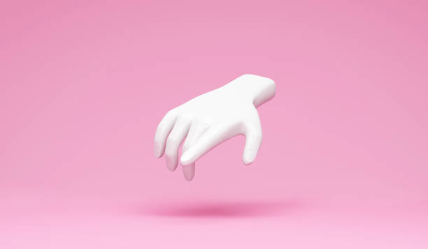 istock White hand pointing to something on pink studio background 1368633150