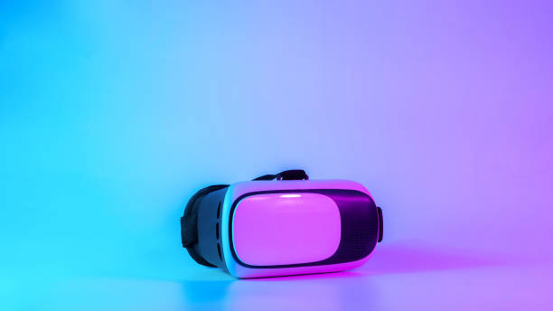 istock VR goggles virtual reality. 3d digital glasses on futuristic neon tech background. Augmented reality, game, future technology concept. VR. 1368634934