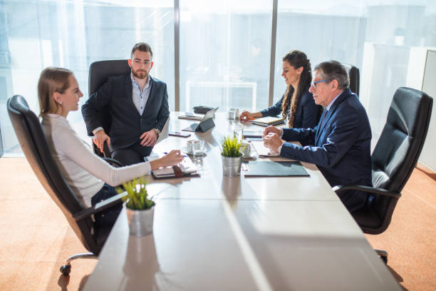 istock Businesspeople Debating Their New Strategy At Office Work Table 1368634986