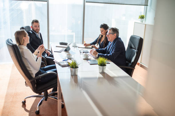 istock Businesspeople Debating Their New Strategy At Office Work Table 1368635001