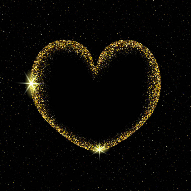 istock Golden heart made of small dust particles on a black background, valentine s day design 1368636595
