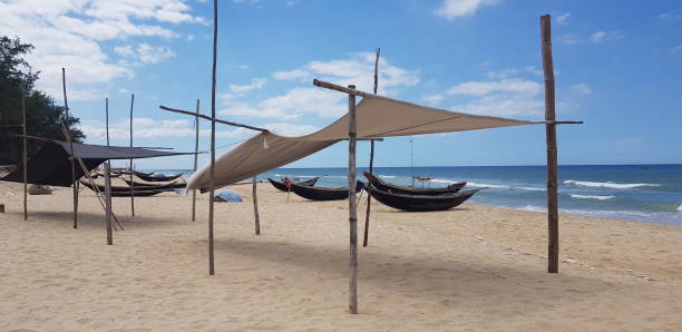 istock Fishing boats on Vietnam Beachfront 1368637479