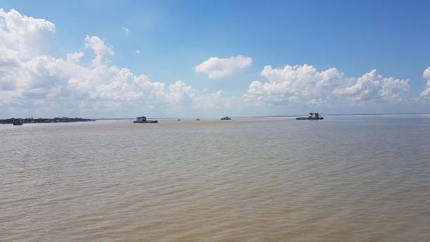 istock Natural blue sky with clouds in the river 1368639635