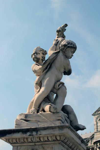 istock Statue of three angels 1368640285
