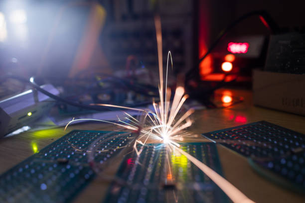 istock Microcircuit for TFT with wires sparkles with electric sparks 1368642080