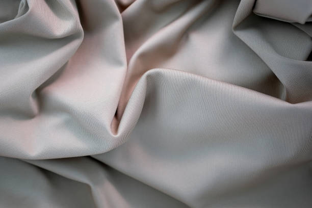 istock Fabric gray in folds top view 1368644203