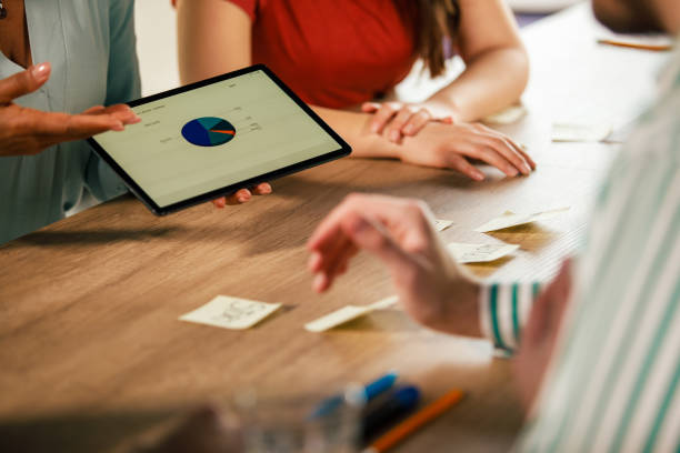 istock Reviewing past data and brainstorming new ideas 1368644521