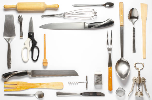 istock Wooden and metal kitchen utensils. Tools for cooking. White background. Flat lay 1368646154