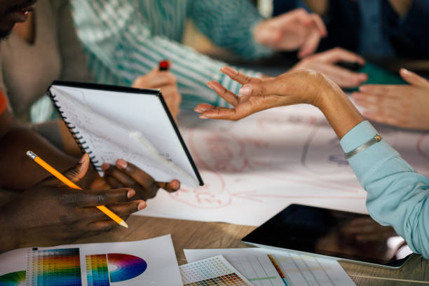 istock Discussing strategies when making a plan for starting a successful new business 1368646257