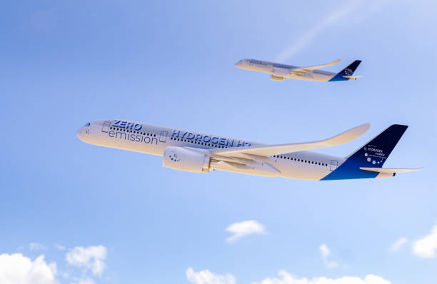 istock Blue Hydrogen filled H2 Aeroplane flying in the sky - future H2 energy concept. 1368646526