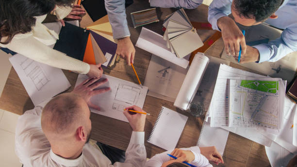 istock Team of design professionals collaborating on a project 1368650253