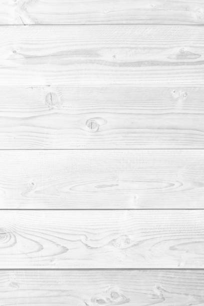 istock White gray wood color texture horizontal for background. Surface light clean of table top view. Natural patterns for design art work and interior or exterior. Grunge old white wood board wall pattern 1368654650
