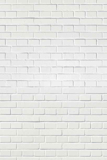 istock White brick wall. Grunge old brick room textured background for wallpaper and graphic web design. Surface of gray brick wall horizontal. Cement texture for pattern and backdrop 1368654716