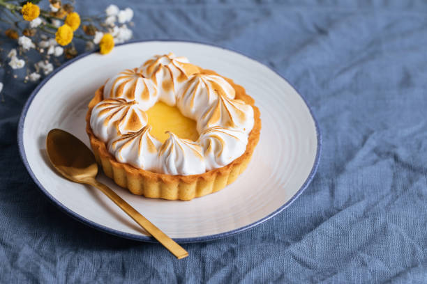 istock Lemon tart with wiped cream on top 1368658861