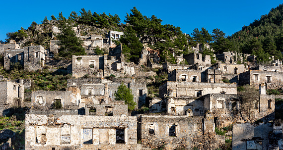 Kayakoy (Levissi Village), which was abandoned by the Greeks during the population exchange long ago.  Kayakoy is located within the borders of Fethiye, a district of Mugla, Turkey.