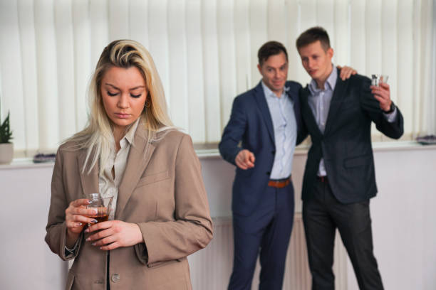 istock Men bullying a young woman 1368665144