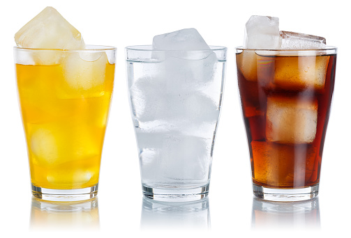 Drinks lemonade cola drink softdrinks glass in a row isolated on a white background
