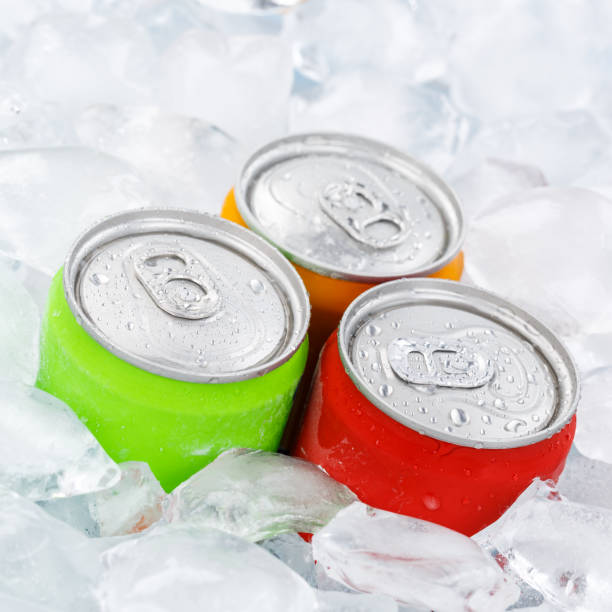 istock Drinks lemonade cola drink softdrinks in cans with ice cubes square 1368666390