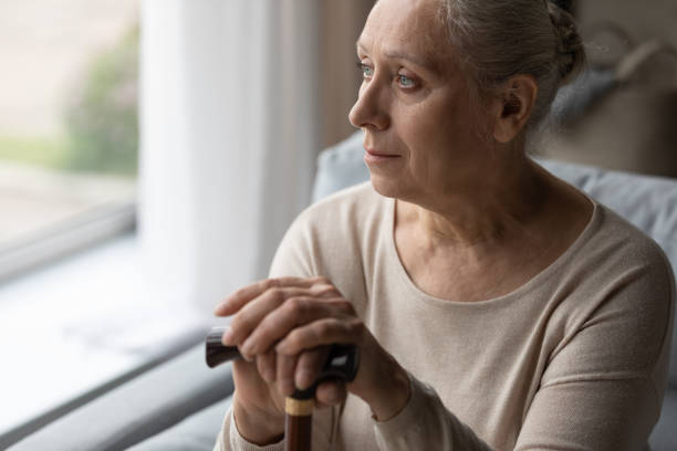 istock Frustrated thoughtful mature 60s grandmother having walking disability. 1368666445