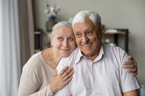 loving retired family couple visualizing future at home. - 96 well imagens e fotografias de stock