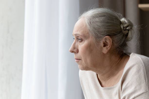 istock Stressed unhappy old woman thinking of problems at home. 1368666476