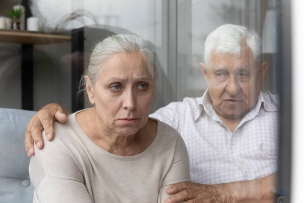 istock Compassionate old 80s retired man supporting elderly wife. 1368666481