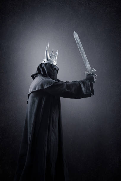 istock Warrior with horned helmet and sword in the dark 1368668578