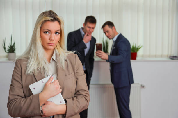 Young professional woman being sexually harassed