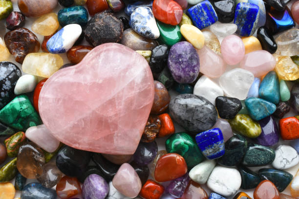istock Chakra Healing Crystals and Heart Shaped Rose Quartz Crystal 1368676651
