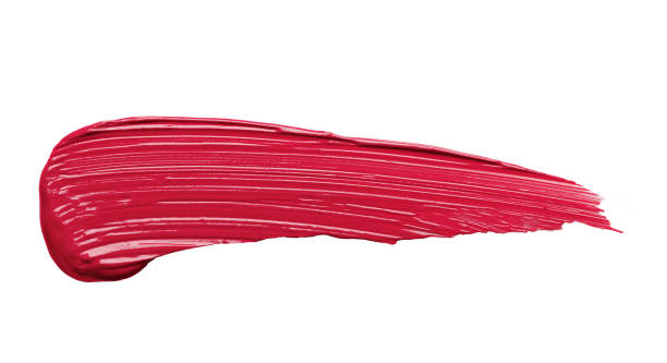 istock Bright fuchsia textured lipstick smear isolated on white background close view 1368680959