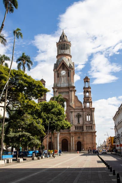 Bolivar Square and the historical Nuestra Señora del Palmar cathedral in Palmira Palmira, Colombia - September, 2021: Bolivar Square and the historical Nuestra Señora del Palmar cathedral in Palmira palmira colombia stock pictures, royalty-free photos & images