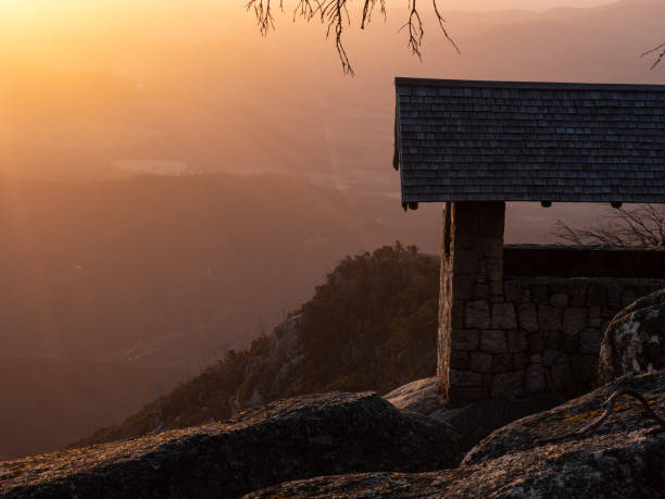 istock Silhouette of a mountain hut at sunset 1368686743