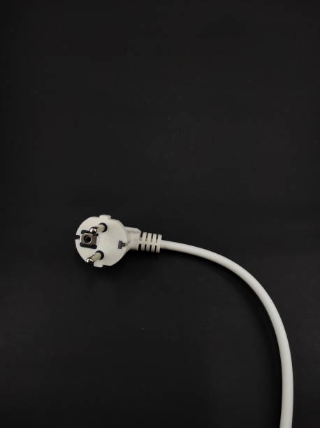 istock White power plug on black - stock photo 1368686938