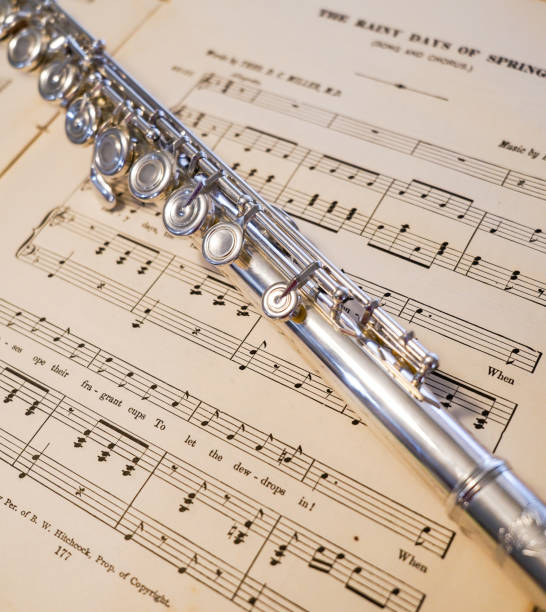 istock Flute on Sheet Music, Close-up 1368691219