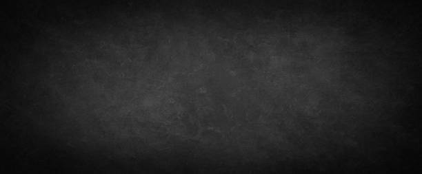 istock Abstract black stone rough grainy Background texture, Dark color 1368695491
