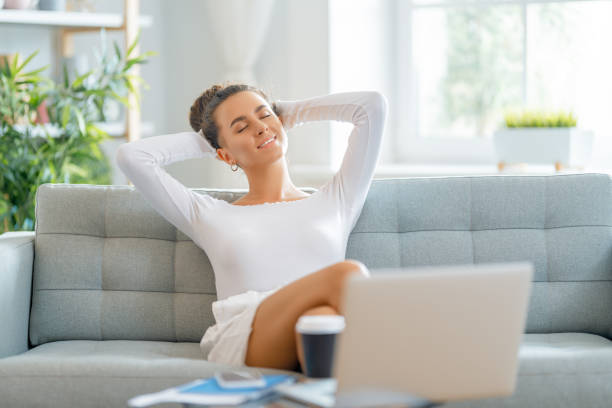 istock woman working on laptop at home. 1368699382